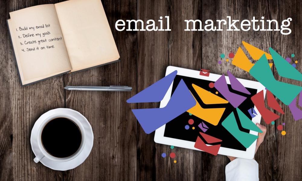 Lets Write Great Emails email marketing blog image mockup of ipad with envelopes and notebook